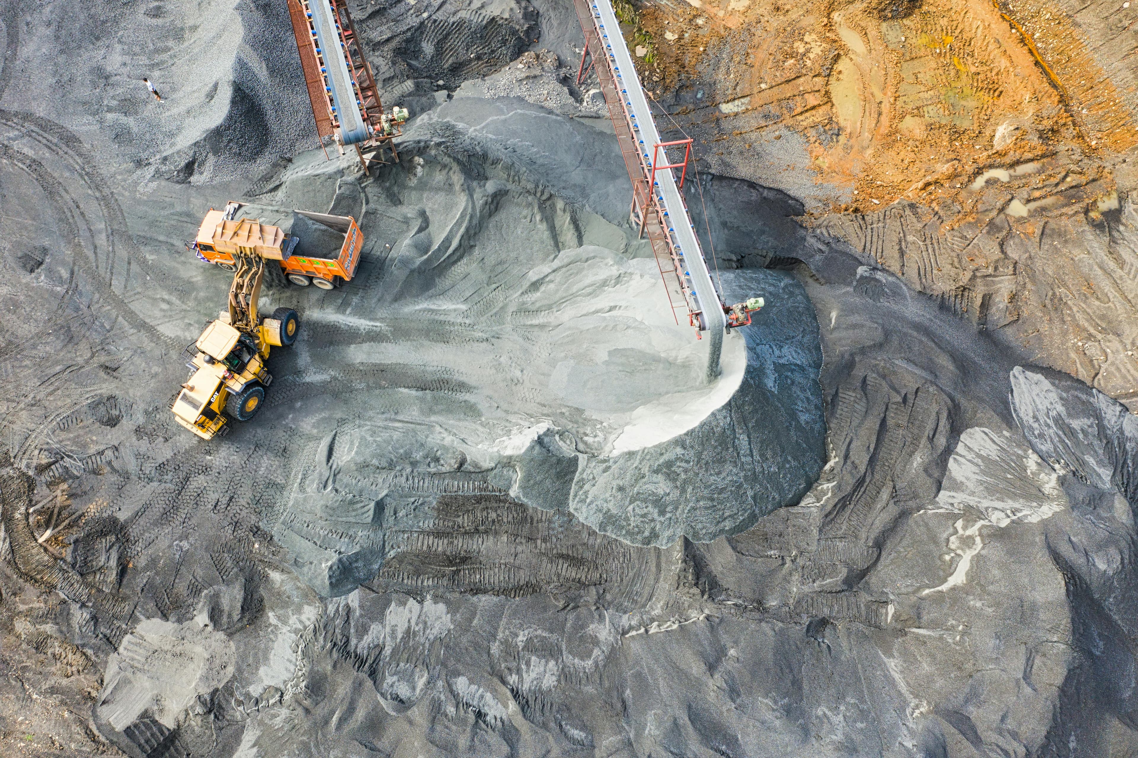 Industrial stone crushing facility — quarry machinery in operation